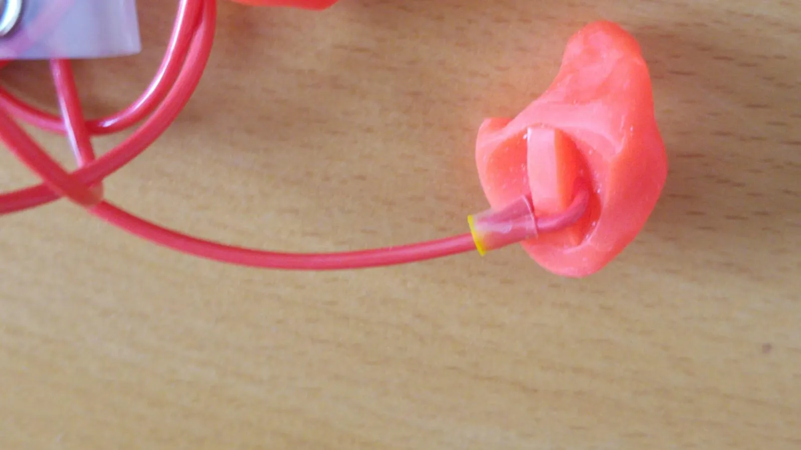 Custom earpiece moulds with their cables.