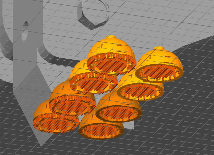 Slicer view of rocket engine nozzle cluster models with supports on a build plate
